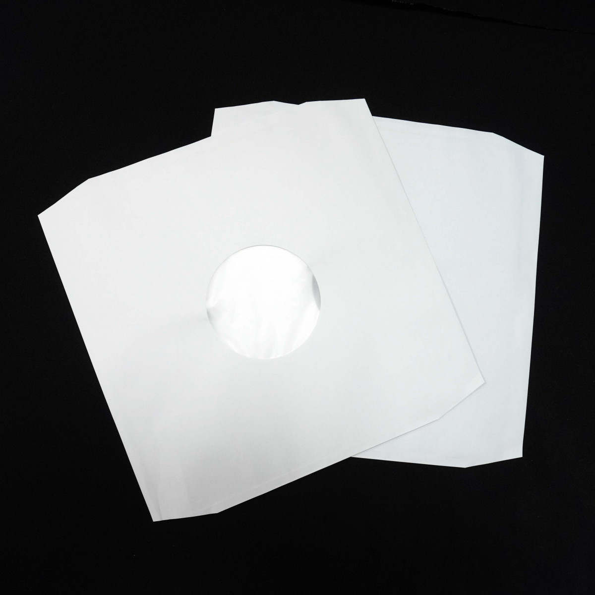 *Внутренние белые антистатические конверты с закругленными углами (20шт)